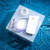 Diamond Smile Power+ Phone Bleaching Mundstück LED Schiene mit Wasser im Hintergrund